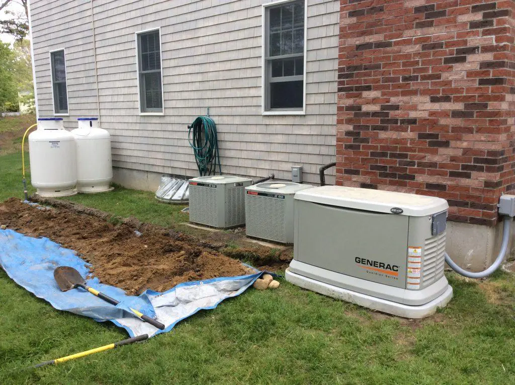 Generac generator with propane tanks and AC units